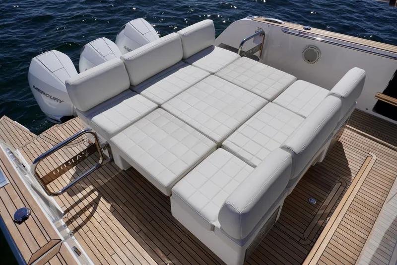  Yacht Photos Pics Luxurious seating area on 2020 Pardo Yachts 38, featuring white cushioned layout.