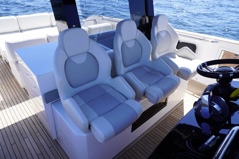  Yacht Photos Pics Luxury seating on 2020 Pardo Yachts 38, featuring sleek design and ocean backdrop.