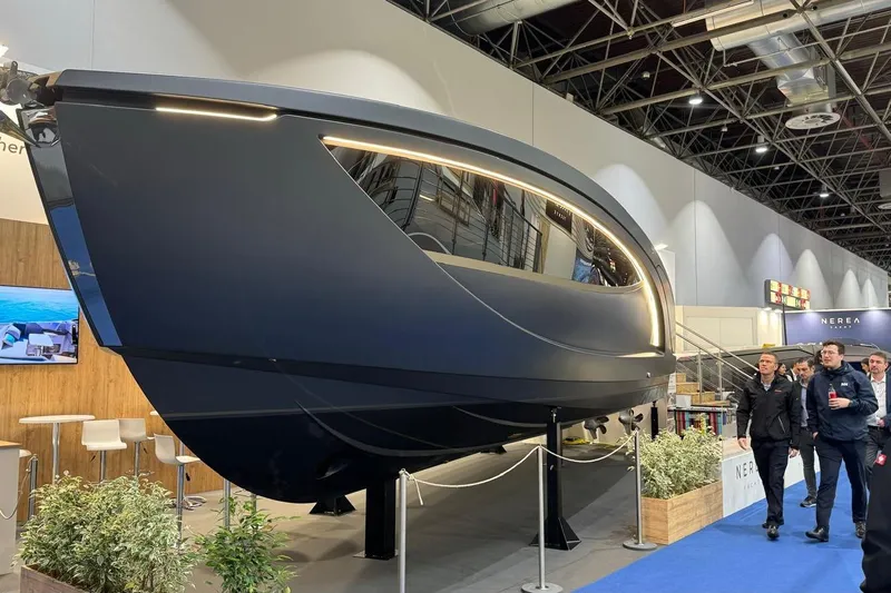  Yacht Photos Pics 2024 Nerea Yacht NY40 displayed at an indoor exhibition with visitors observing.