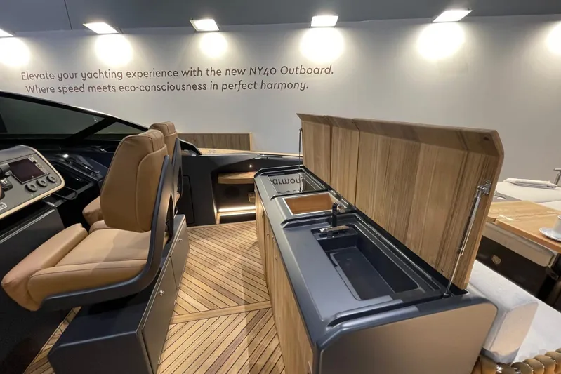  Yacht Photos Pics 2024 Nerea Yacht NY40 interior with modern helm and sleek wooden cabinetry.