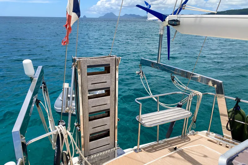  Yacht Photos Pics Sailing yacht Amel Super Maramu 1991, deck view with ocean and distant islands.