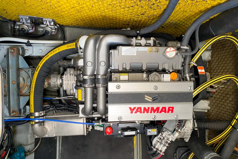 Yacht Photos Pics Engine compartment of a 1991 Amel Super Maramu with a Yanmar engine.