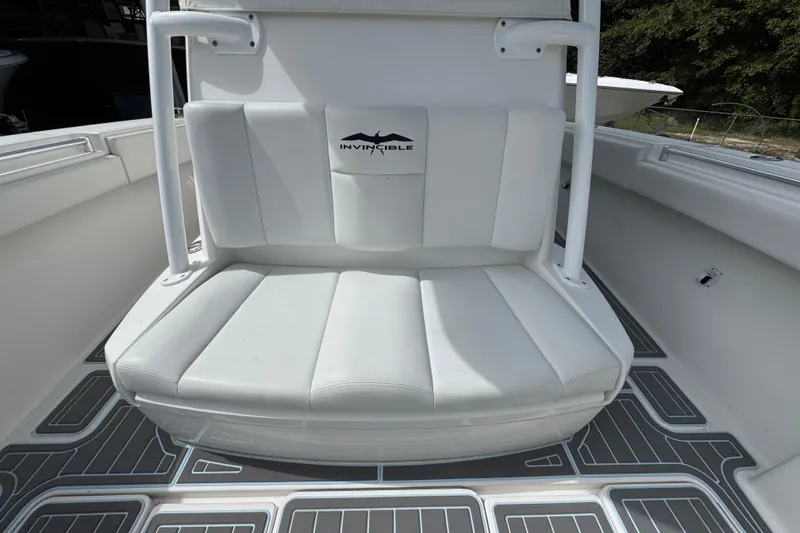  Yacht Photos Pics 2019 Invincible 39 Open Fisherman boat with white cushioned seating and logo.