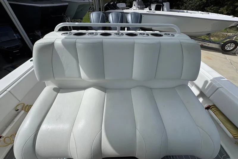  Yacht Photos Pics 2019 Invincible 39 Open Fisherman boat with white cushioned seating and cup holders.