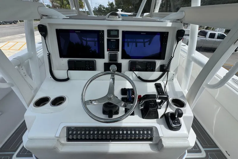  Yacht Photos Pics 2019 Invincible 39 Open Fisherman helm with dual displays and controls.