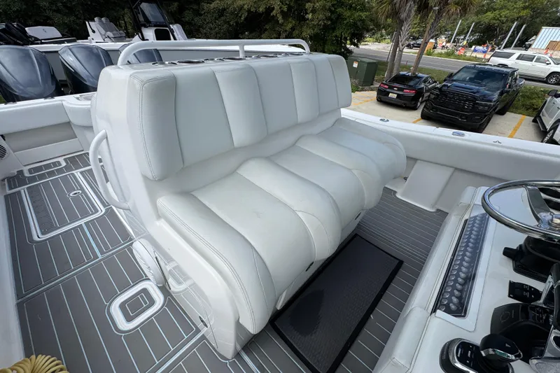  Yacht Photos Pics 2019 Invincible 39 Open Fisherman boat interior with white seating and modern controls.