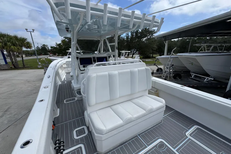  Yacht Photos Pics 2019 Invincible 39 Open Fisherman boat with white seating and sleek deck design.