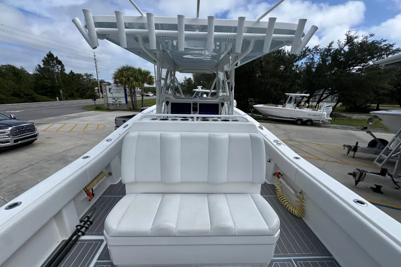  Yacht Photos Pics 2019 Invincible 39 Open Fisherman boat with white seating and rod holders.