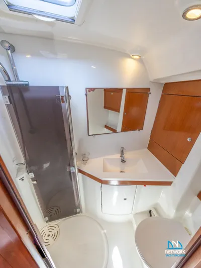  Yacht Photos Pics Beneteau Oceanis 46 bathroom, 2011 model, featuring modern fixtures and compact design.