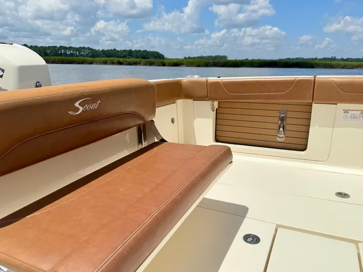 Wild Horses Yacht Photos Pics 2020 Scout 380 LXF boat interior with tan leather seating, scenic water view.