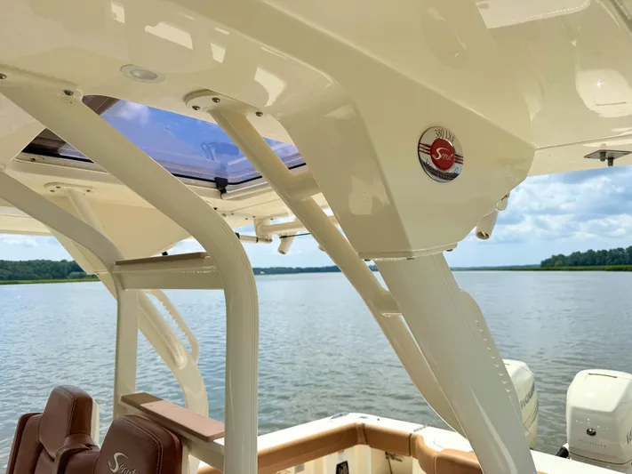 Wild Horses Yacht Photos Pics 2020 Scout 380 LXF boat interior with lake view and clear sky.