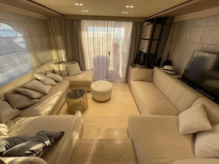  Yacht Photos Pics Luxurious interior of 2021 Ferretti Yachts 670 with elegant beige seating and modern decor.