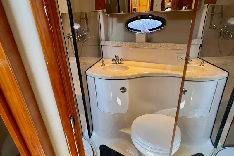 Santa Josefina Yacht Photos Pics Luxurious 2009 Regal 4080 yacht bathroom with dual sinks and modern fixtures.
