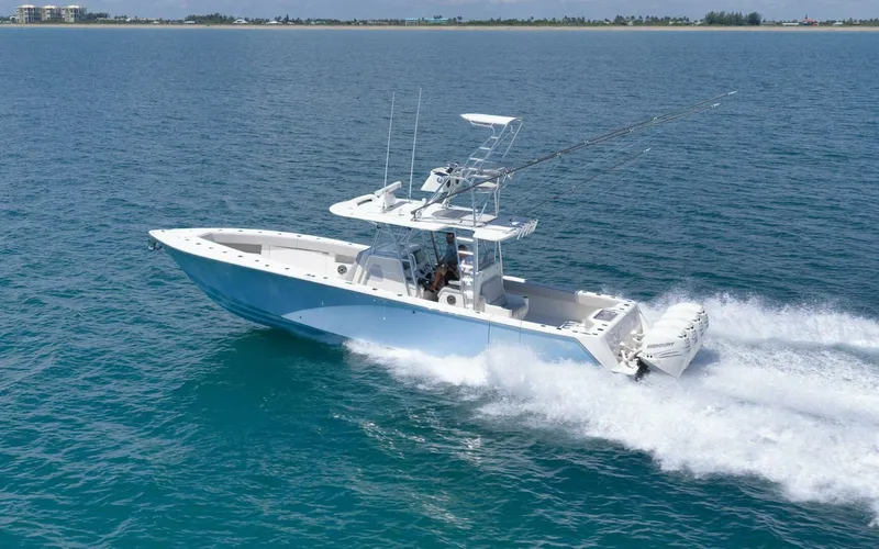 Yacht Photos Pics 2020 SeaVee 39 boat cruising on open water, showcasing sleek design and powerful engines.