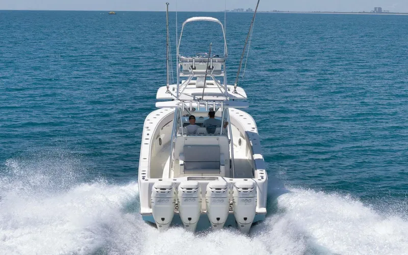  Yacht Photos Pics 2020 SeaVee 39 boat cruising on open water with four engines.