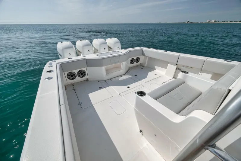  Yacht Photos Pics 2020 SeaVee 39 boat deck with seating, ocean view, and multiple outboard engines.