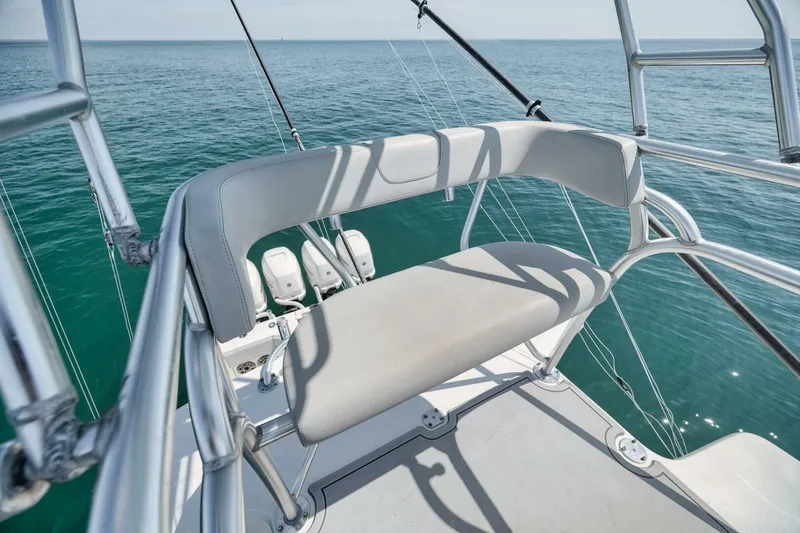  Yacht Photos Pics 2020 SeaVee 39 boat with elevated seating, overlooking calm ocean waters.