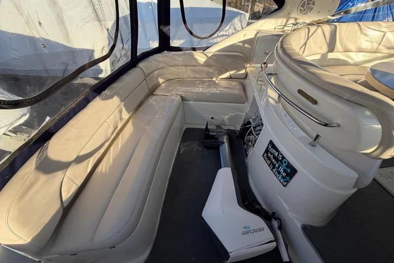 All Too Swell Yacht Photos Pics Interior of 2002 Regal Commodore 3860 yacht with white leather seating.