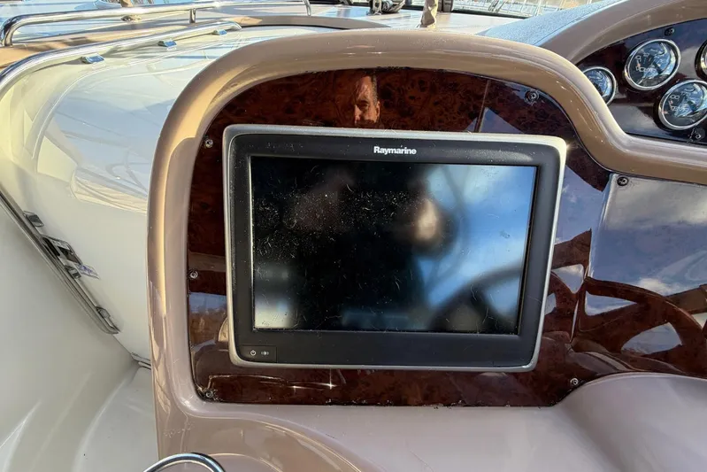 All Too Swell Yacht Photos Pics Dashboard of 2002 Regal Commodore 3860 with Raymarine navigation display.