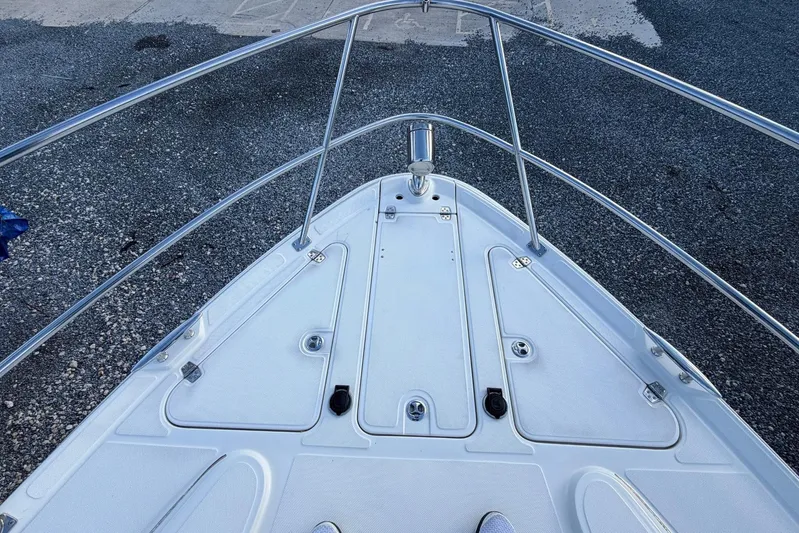 All Too Swell Yacht Photos Pics Bow of 2002 Regal Commodore 3860 boat with stainless steel railings.