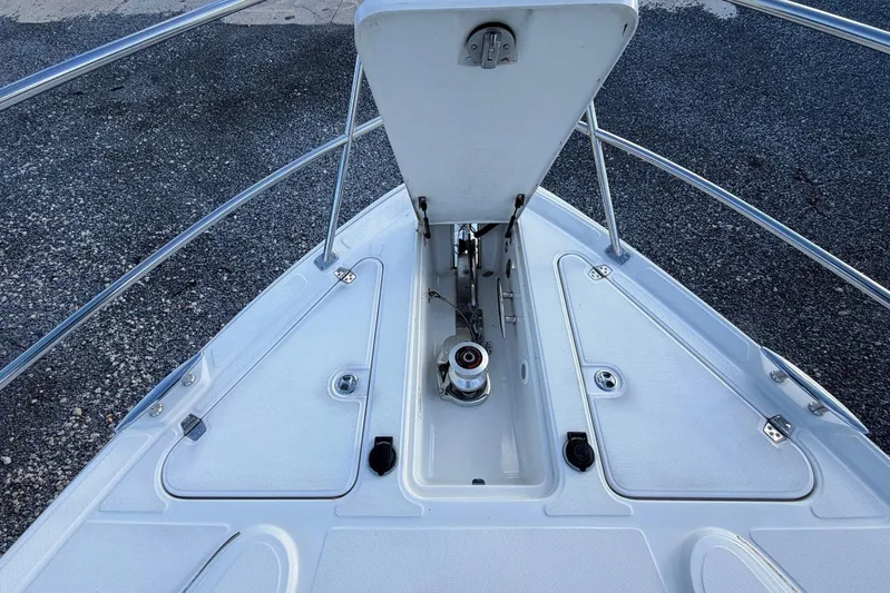 All Too Swell Yacht Photos Pics Bow of 2002 Regal Commodore 3860 yacht with anchor compartment open.