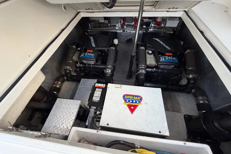 All Too Swell Yacht Photos Pics Engine compartment of 2002 Regal Commodore 3860 with twin Mercury 8.1S HO engines.