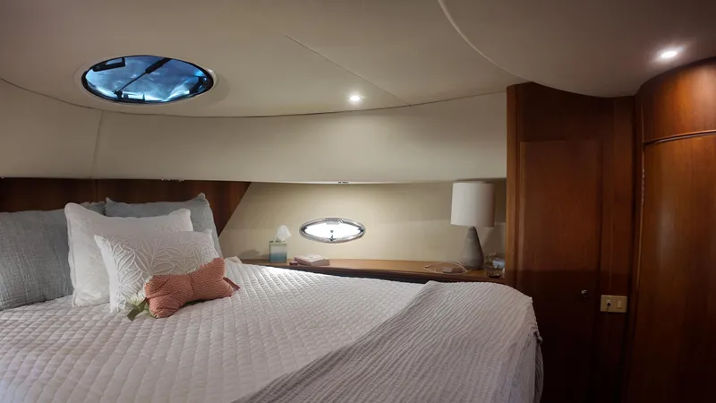  Yacht Photos Pics Luxurious cabin interior of 2002 Silverton 410 Sport Bridge yacht.