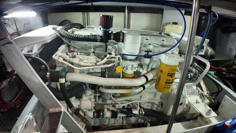  Yacht Photos Pics Engine room of 2002 Silverton 410 Sport Bridge with visible components and wiring.