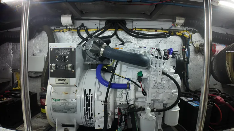  Yacht Photos Pics Engine room of 2002 Silverton 410 Sport Bridge with generator and wiring.