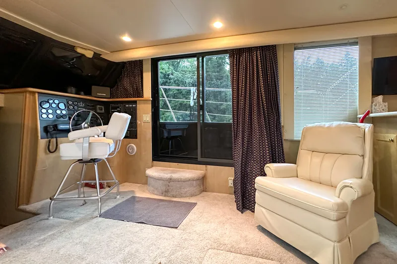  Yacht Photos Pics Interior of 2012 Bluewater 5200 Custom Series Yacht with helm and seating area.