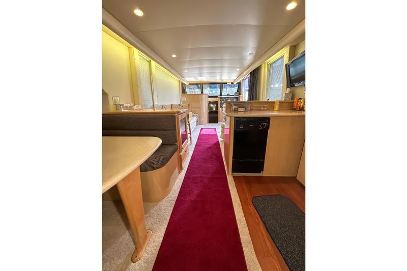  Yacht Photos Pics Luxurious interior of 2012 Bluewater 5200 Custom Series Yacht with modern amenities.