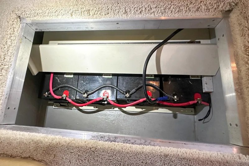  Yacht Photos Pics Battery compartment of 2012 Bluewater 5200 Custom Series Yacht with connected cables.