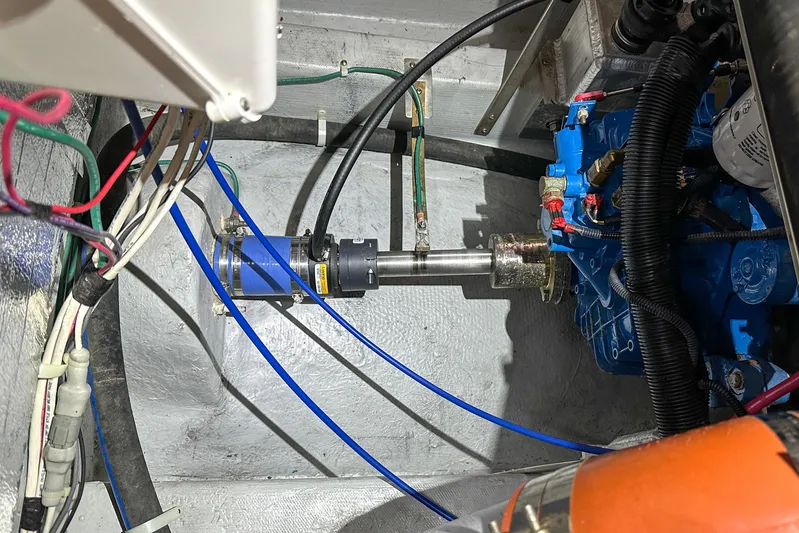  Yacht Photos Pics Engine compartment of 2012 Bluewater 5200 Custom Series Yacht, showcasing mechanical components and wiring.