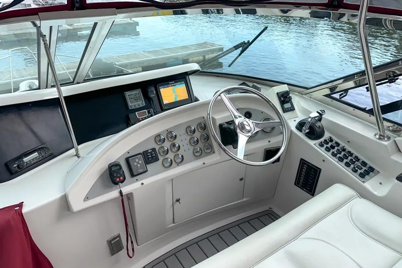  Yacht Photos Pics Helm of 2012 Bluewater 5200 yacht with modern navigation instruments and controls.