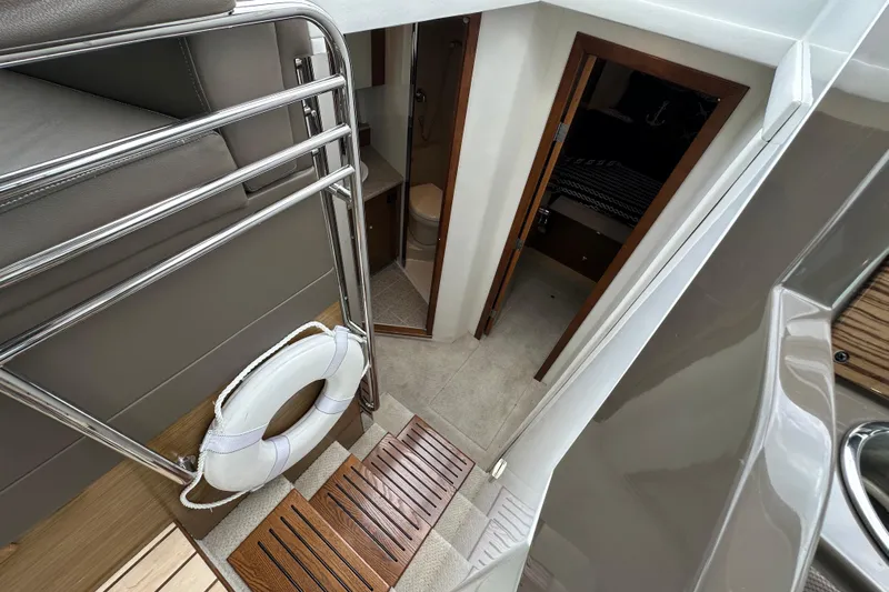 Sexy B'yacht-ch Yacht Photos Pics Interior view of 2013 Cruisers Yachts 45 Cantius, featuring stairs and cabin entrance.