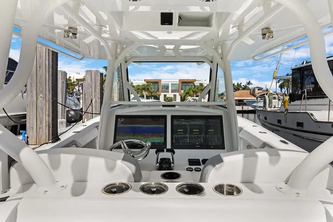 Seas The Day Yacht Photos Pics 2020 Yellowfin 39 Center Console boat cockpit with advanced navigation displays.