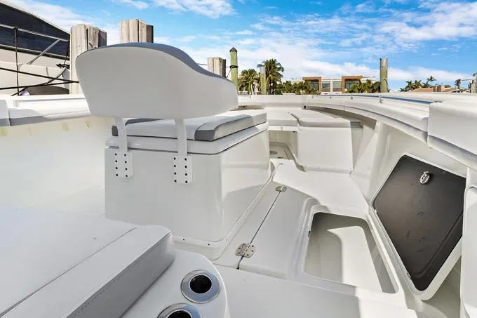 Seas The Day Yacht Photos Pics 2020 Yellowfin 39 Center Console boat interior with seating and storage compartments.