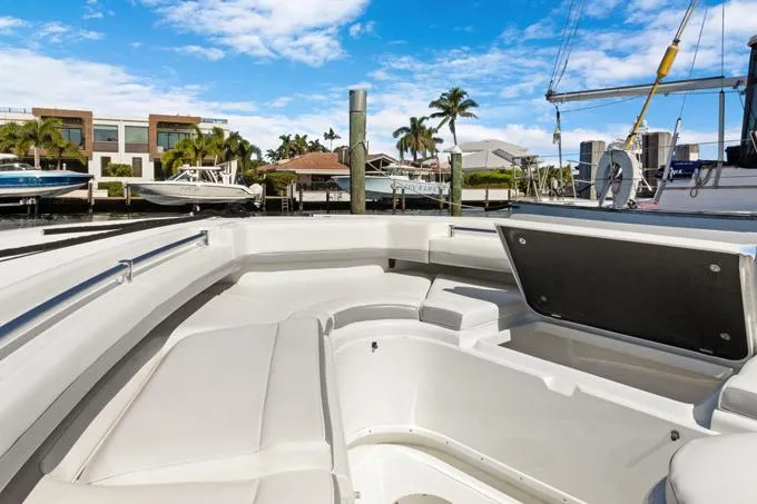 Seas The Day Yacht Photos Pics 2020 Yellowfin 39 Center Console boat interior at marina, clear sky, palm trees.