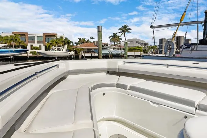 Seas The Day Yacht Photos Pics 2020 Yellowfin 39 Center Console boat docked in a sunny marina.