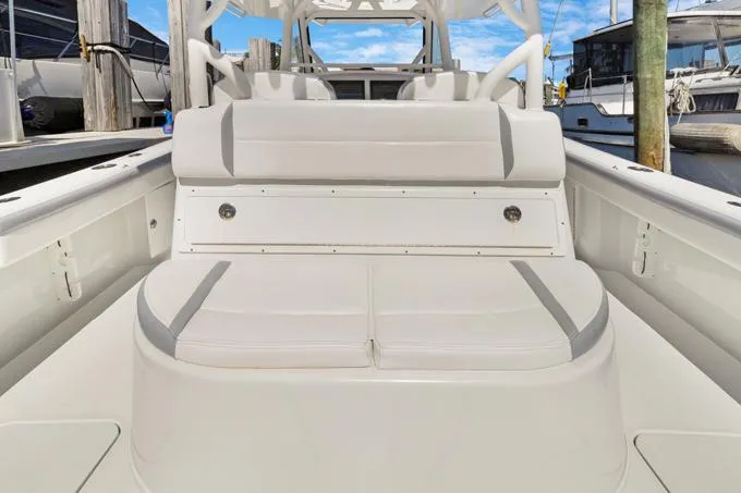 Seas The Day Yacht Photos Pics 2020 Yellowfin 39 Center Console boat interior with cushioned seating at the dock.