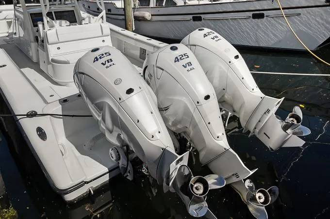 Seas The Day Yacht Photos Pics 2020 Yellowfin 39 Center Console with triple 425 V8 outboard engines docked.