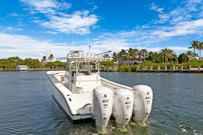 Seas The Day Yacht Photos Pics 2020 Yellowfin 39 Center Console boat with triple 425 V8 engines on a sunny day.