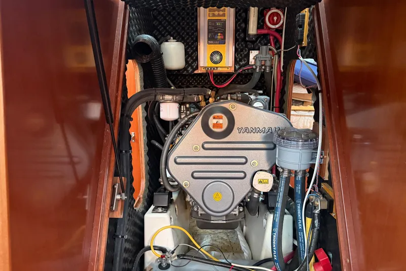 Aeolus Yacht Photos Pics Yanmar engine in a 2007 Beneteau 423 sailboat, showcasing detailed mechanical components.