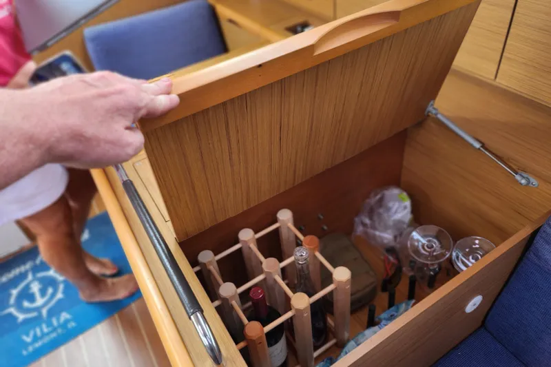 Vilia Yacht Photos Pics Wine storage compartment on 2010 Jeanneau Sun Odyssey 45 DS yacht interior.
