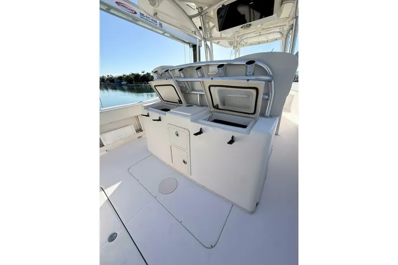 Repowered Yacht Photos Pics 2011 Grady-White Canyon 336 boat interior with open storage compartments.