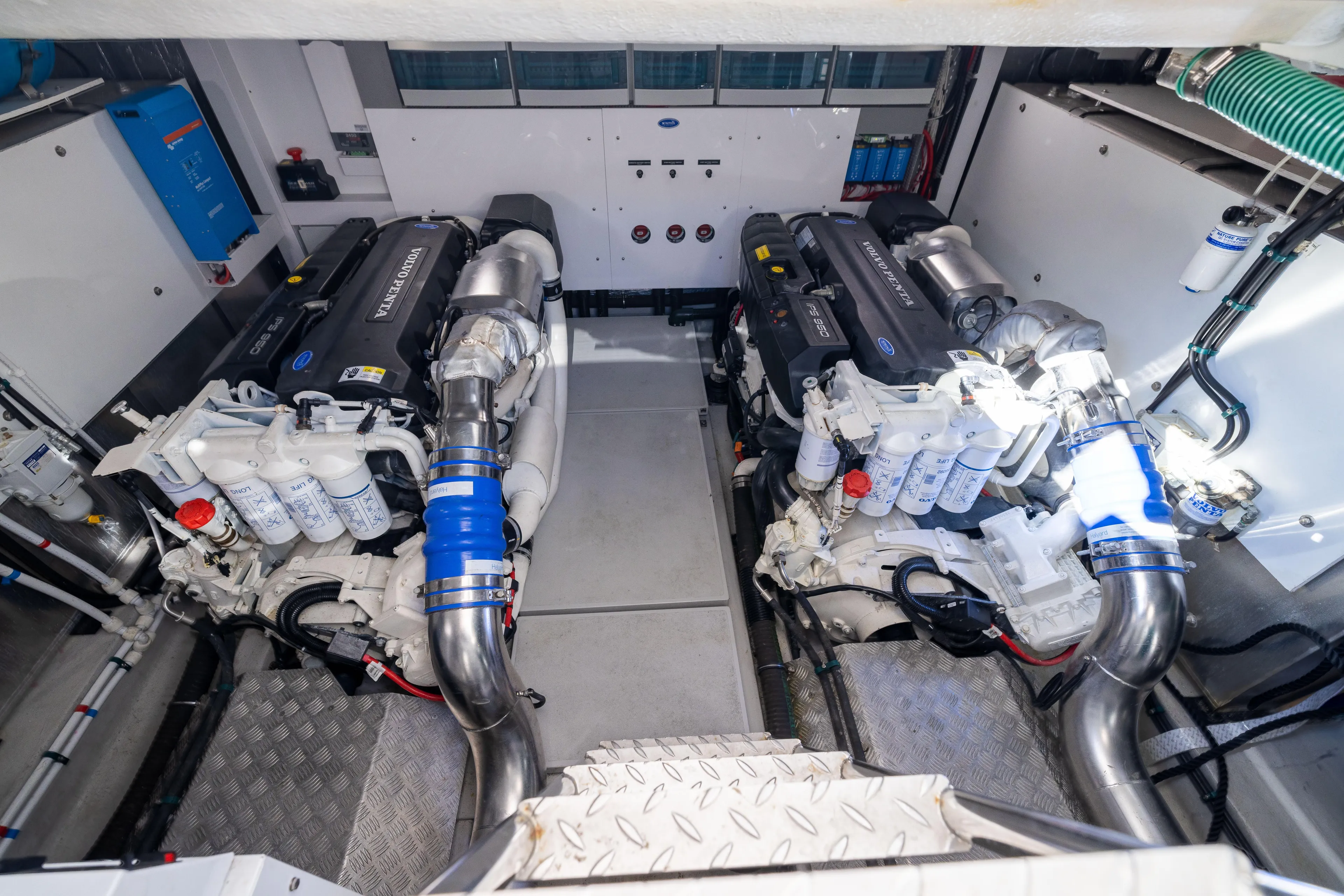 In The Moment Yacht Photos Pics Engine room of 2018 Sunseeker Manhattan 52 yacht, featuring dual Volvo Penta engines.