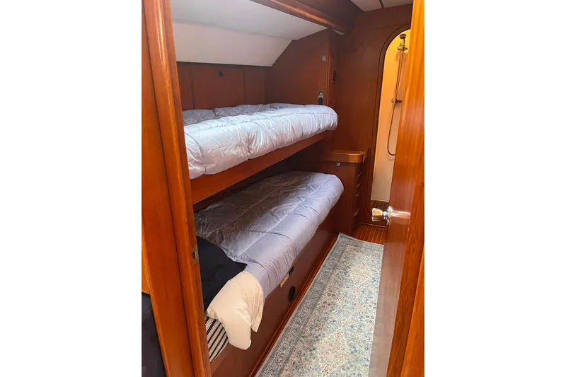  Yacht Photos Pics Cozy cabin with bunk beds on 1990 Nautor Swan 61 yacht.