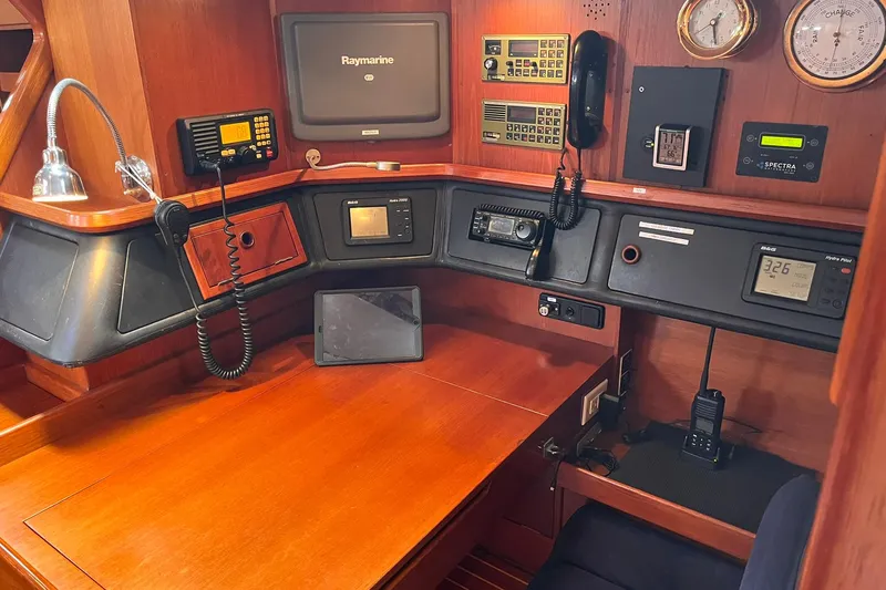  Yacht Photos Pics Navigation station of a 1990 Nautor Swan 61 yacht with communication equipment.