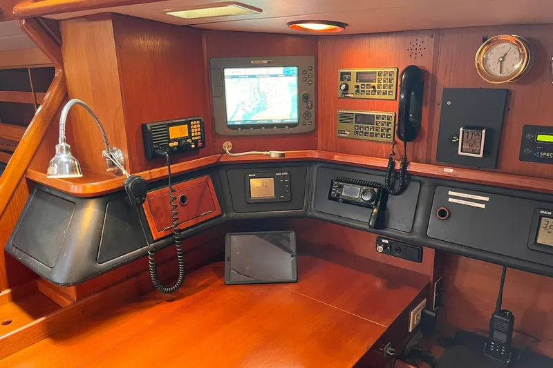  Yacht Photos Pics Navigation station of 1990 Nautor Swan 61 yacht with instruments and communication equipment.