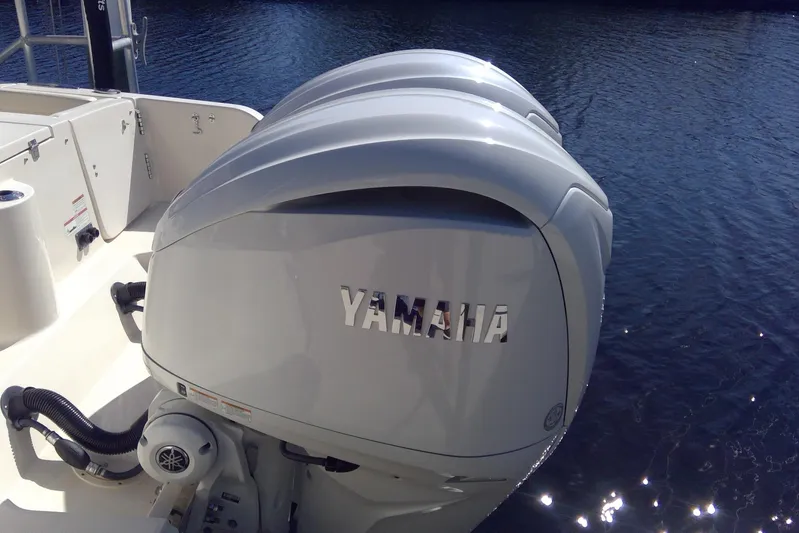  Yacht Photos Pics 2023 Grady-White Freedom 285 with Yamaha outboard engine on water.